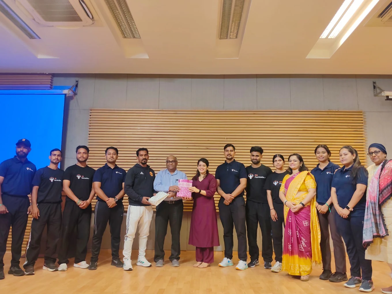 Corporate wellness program team and partners