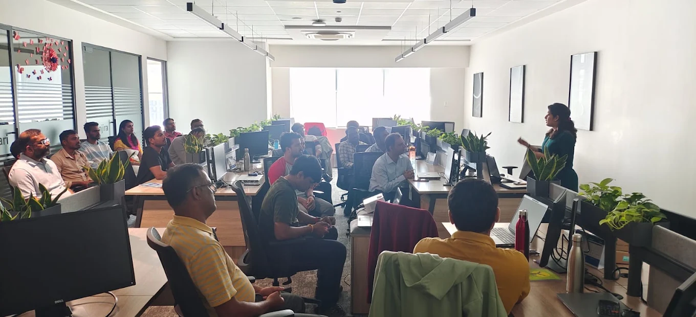 Megha leading a nutrition seminar for employees in a corporate office